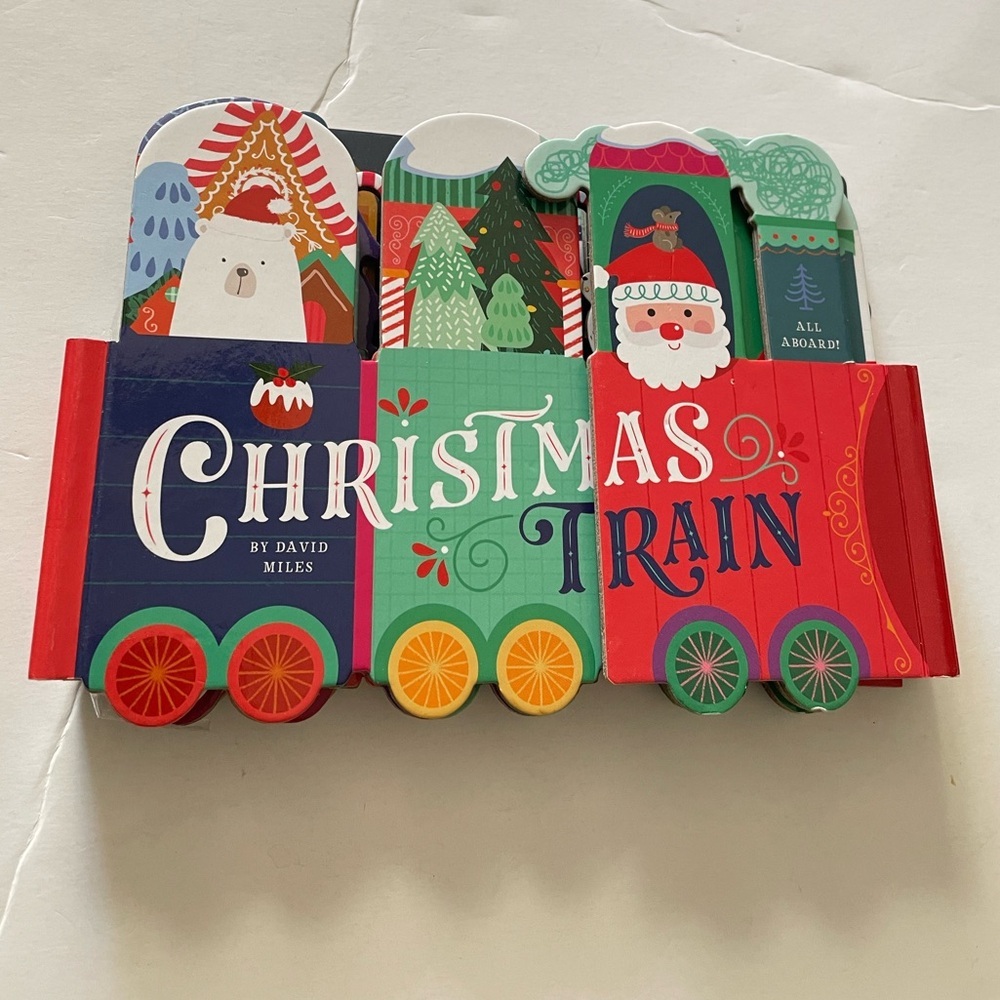 Christmas Train" by David Miles, an interactive children's board book